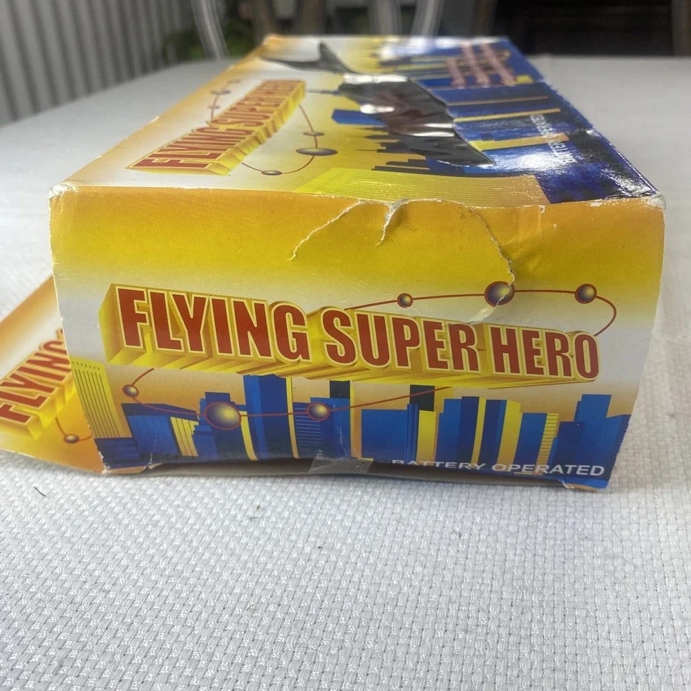 Flying Super Hero Action Figure Toy Battery Operated Cape Included Spins In Air